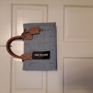 True religion denim handbag .blue and tan.11.5w 7.5h.nwt